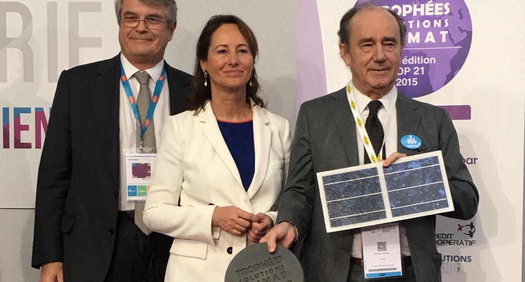 three people posing for a photo including Ségolène Royal