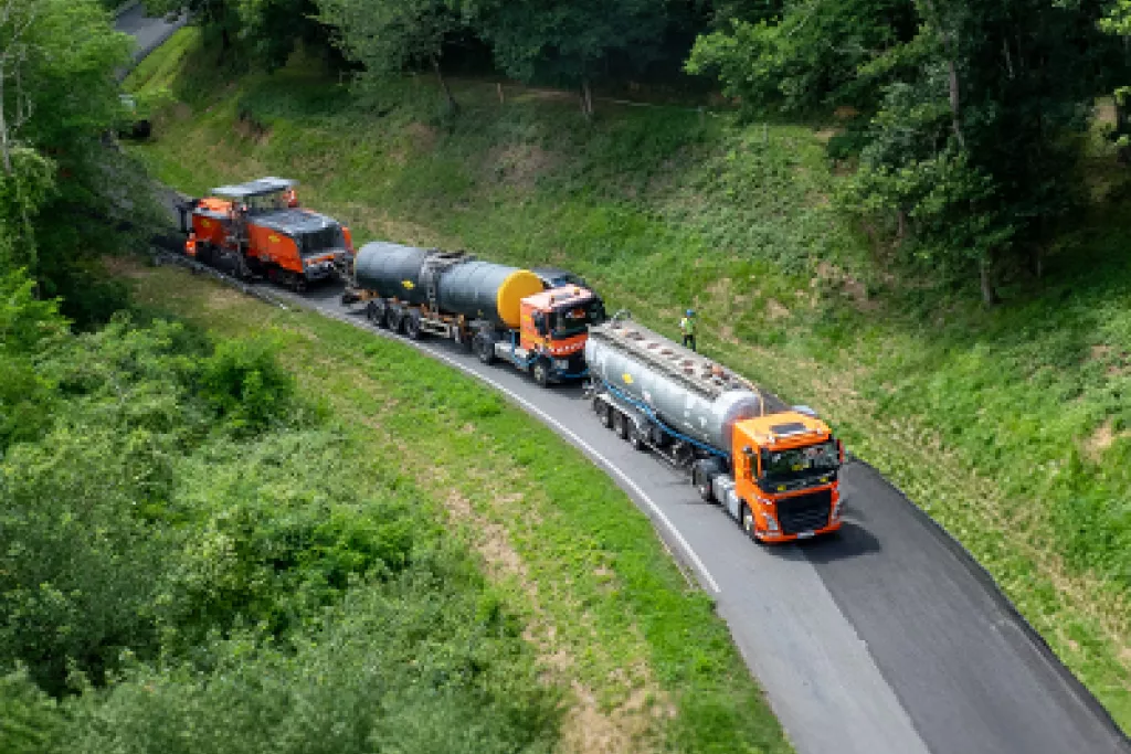 Green campaign with vehicles on the road