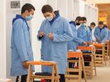 Atelier technique du programme IECD où les étudiants acquièrent des compétences en maintenance électrique et automatisation industrielle.