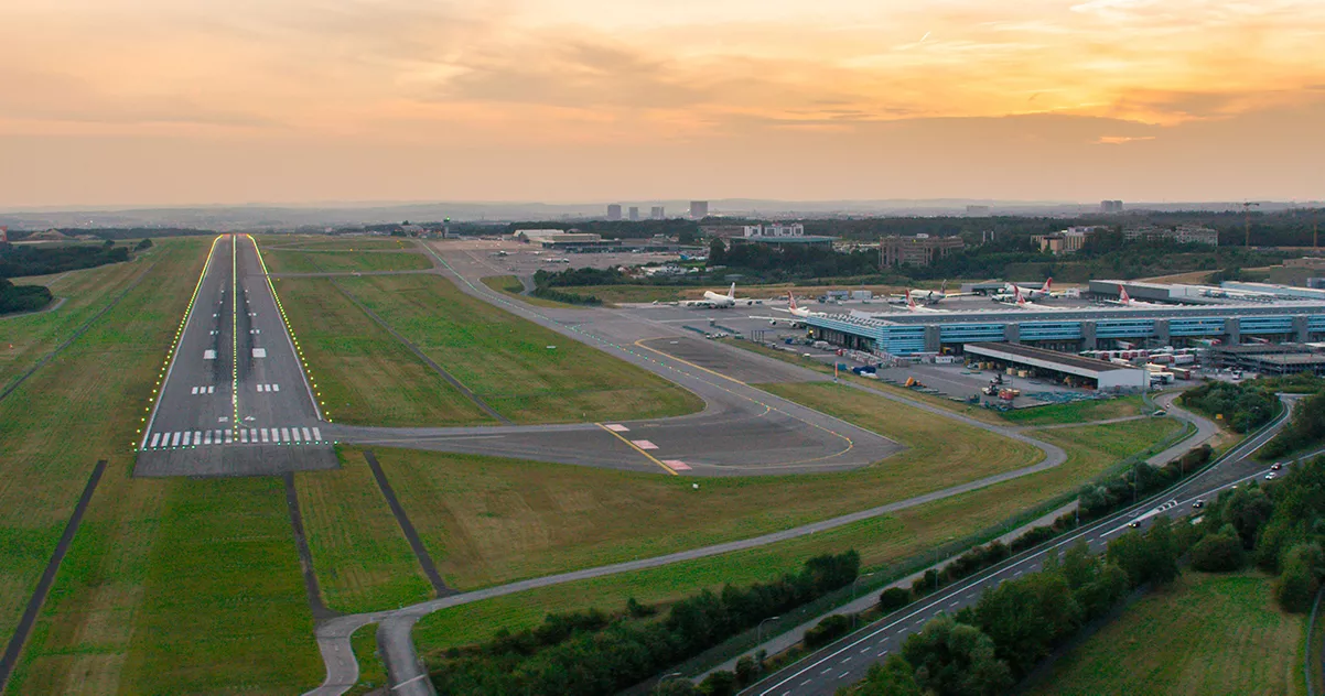 Sunset over the airport and its runway