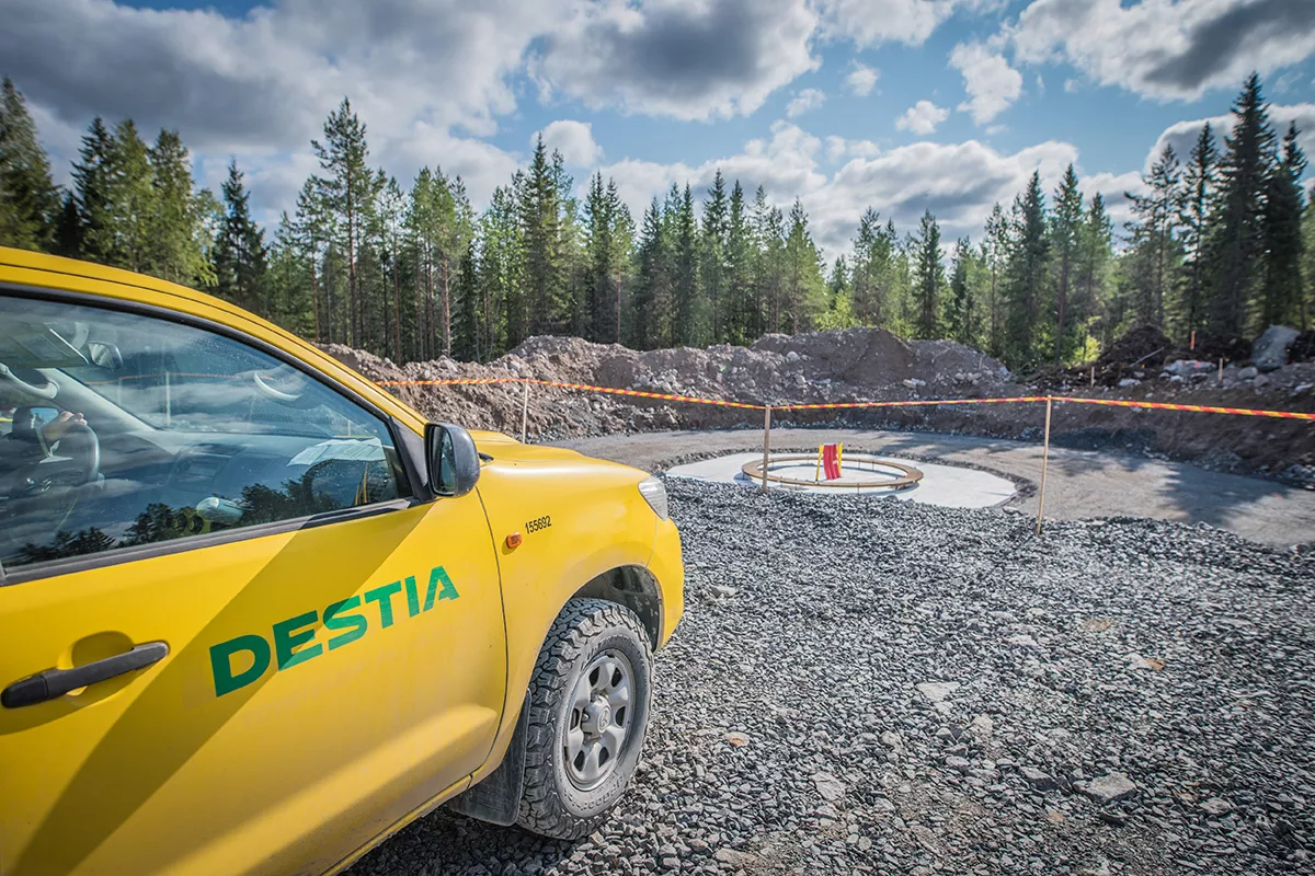 Yellow car outside a construction site