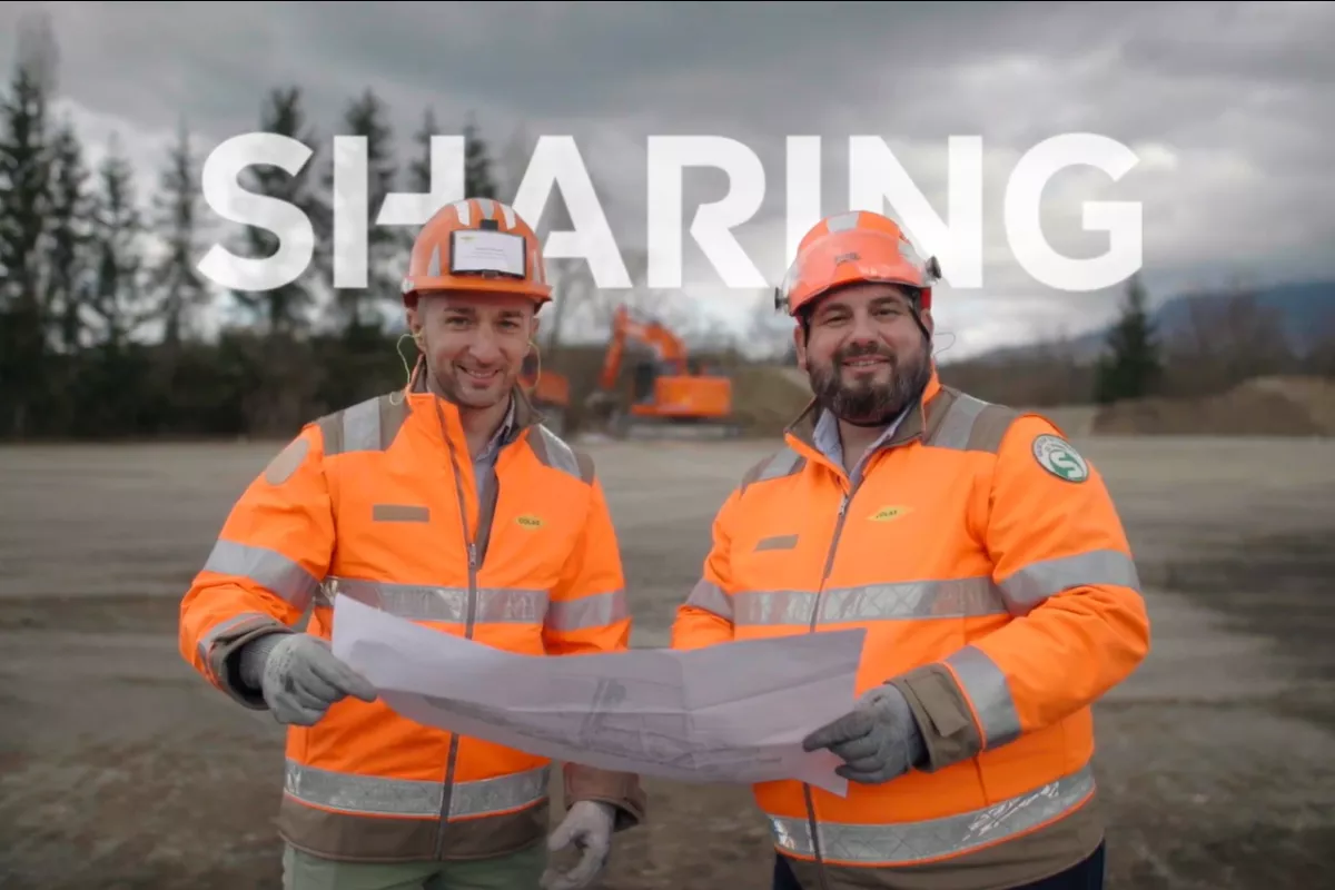 Colas Brand Film – two employees looking at a plan